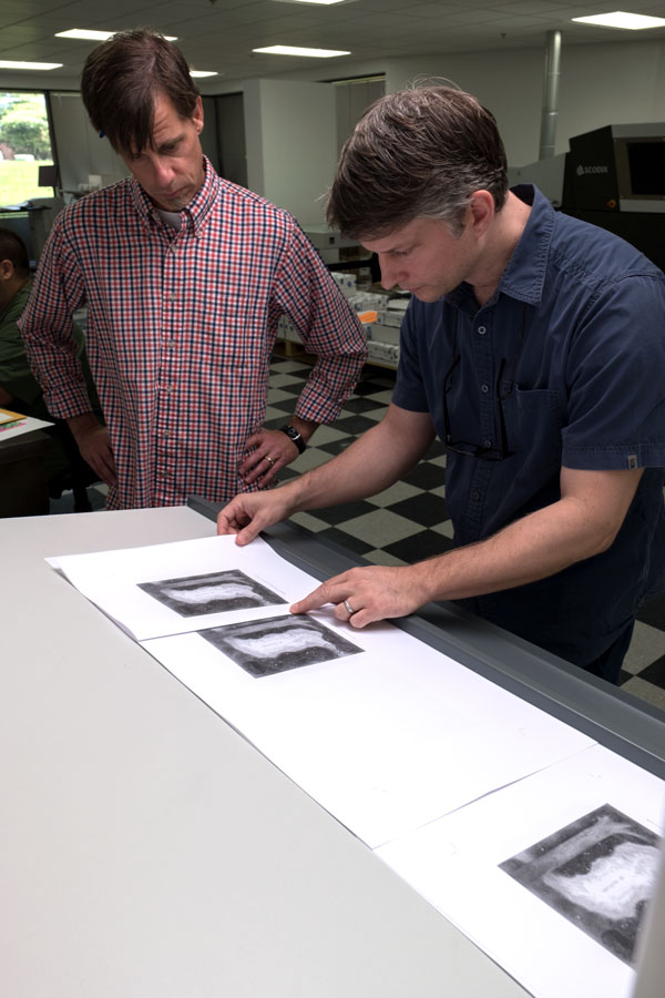Brian Glasier and Joshua Marsh working on Paper Garden